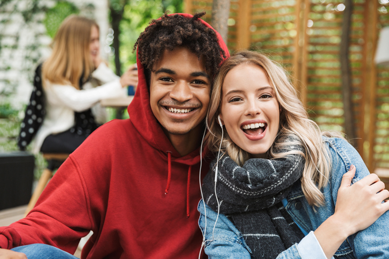 young couple smiling at the camera